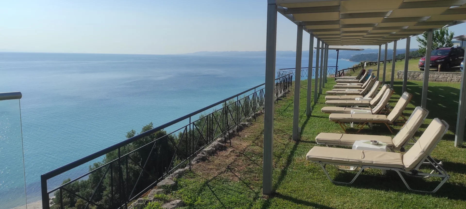 Traditional stone architecture and sea view at Aegean Blue Afitos